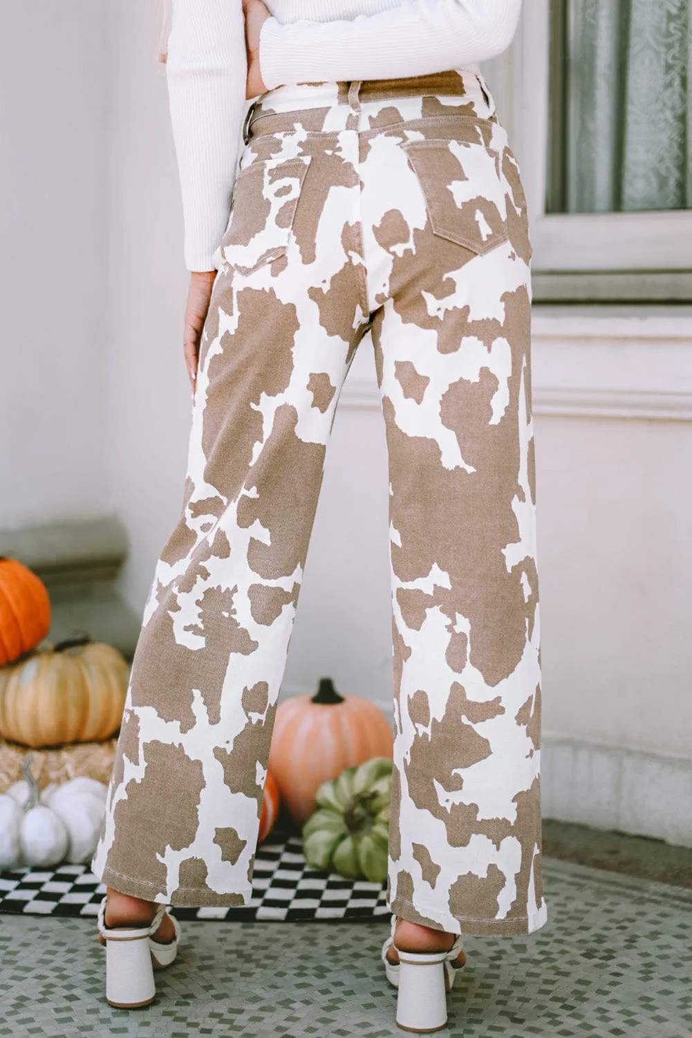 Brown and White Cow Print Flared Jeans