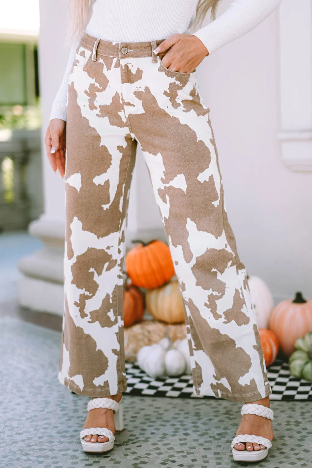 Brown and White Cow Print Flared Jeans